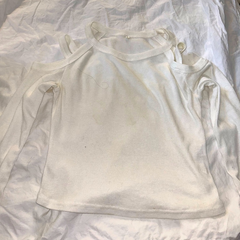 Size small white long sleeve with cut outs on shoulder